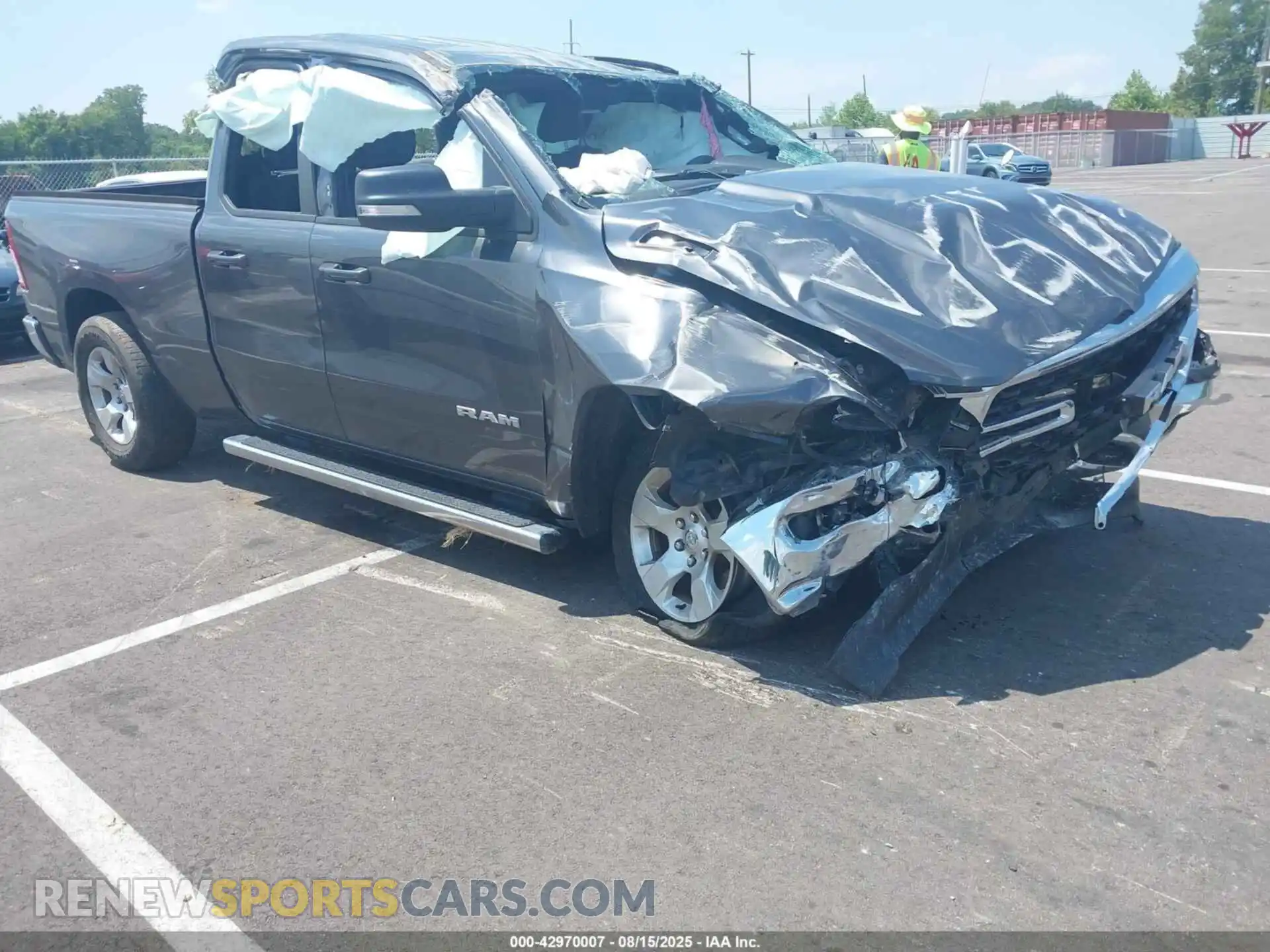 1 Photograph of a damaged car 1C6RREBTXNN201715 RAM 1500 2022
