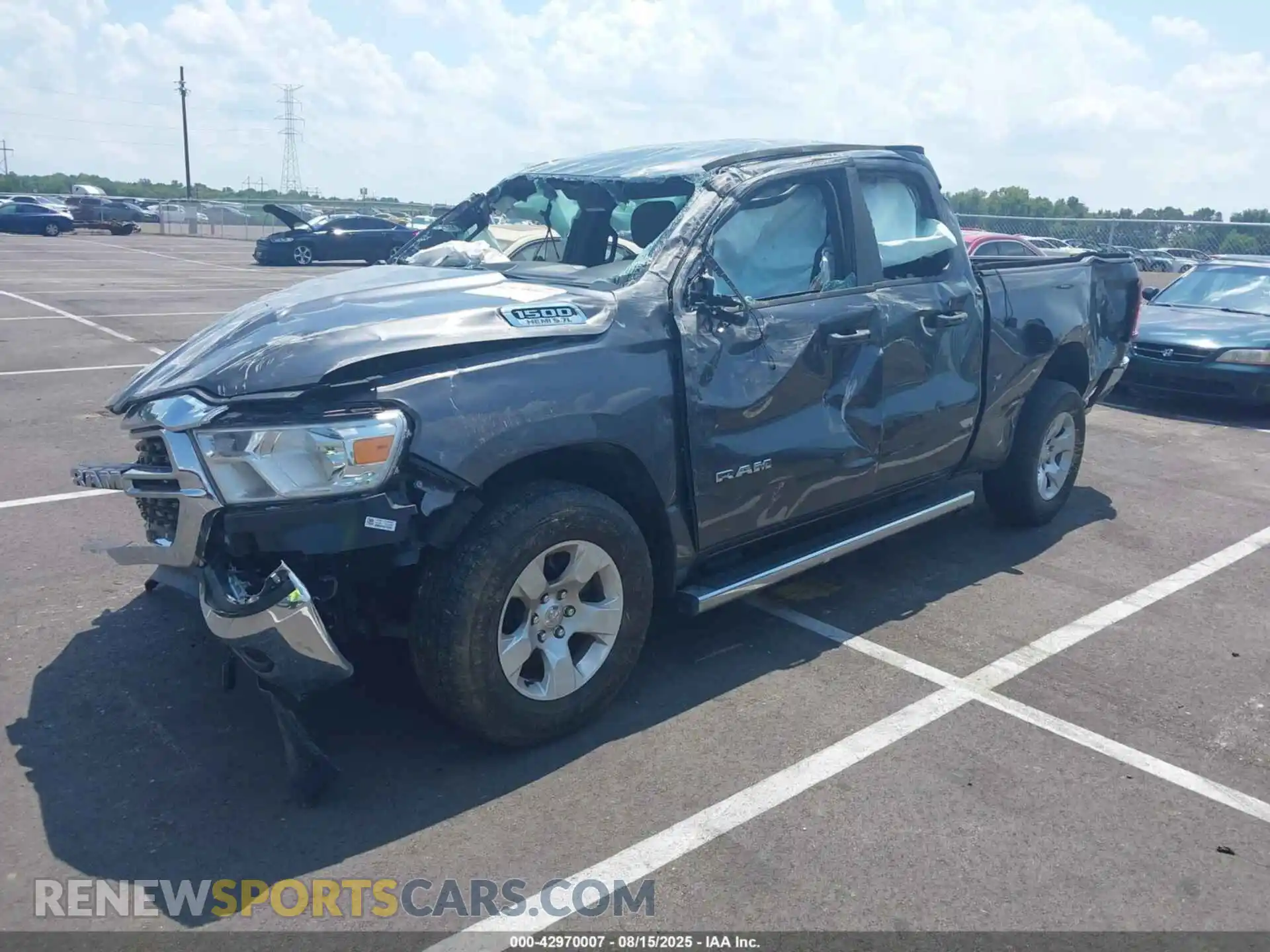 2 Photograph of a damaged car 1C6RREBTXNN201715 RAM 1500 2022