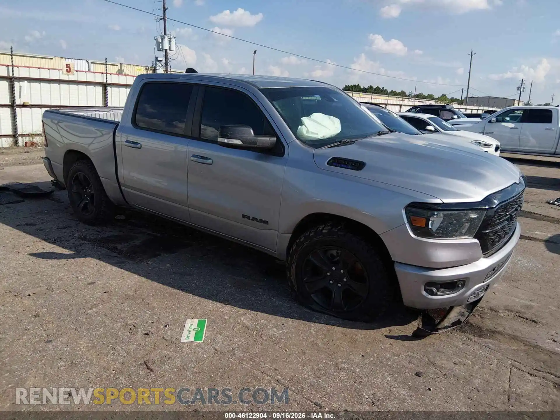 1 Photograph of a damaged car 1C6RREFG3NN407777 RAM 1500 2022