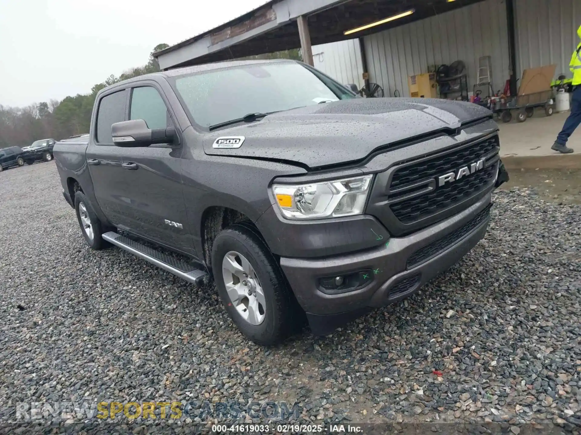 1 Photograph of a damaged car 1C6RREFG6NN337093 RAM 1500 2022