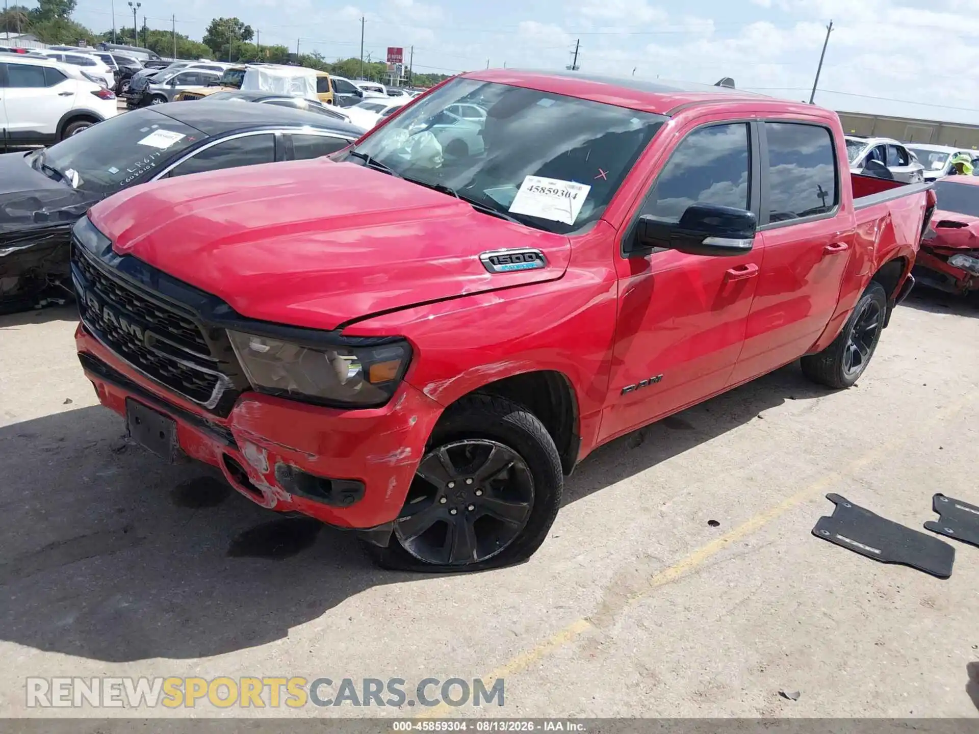 2 Photograph of a damaged car 1C6RREFG6NN472395 RAM 1500 2022