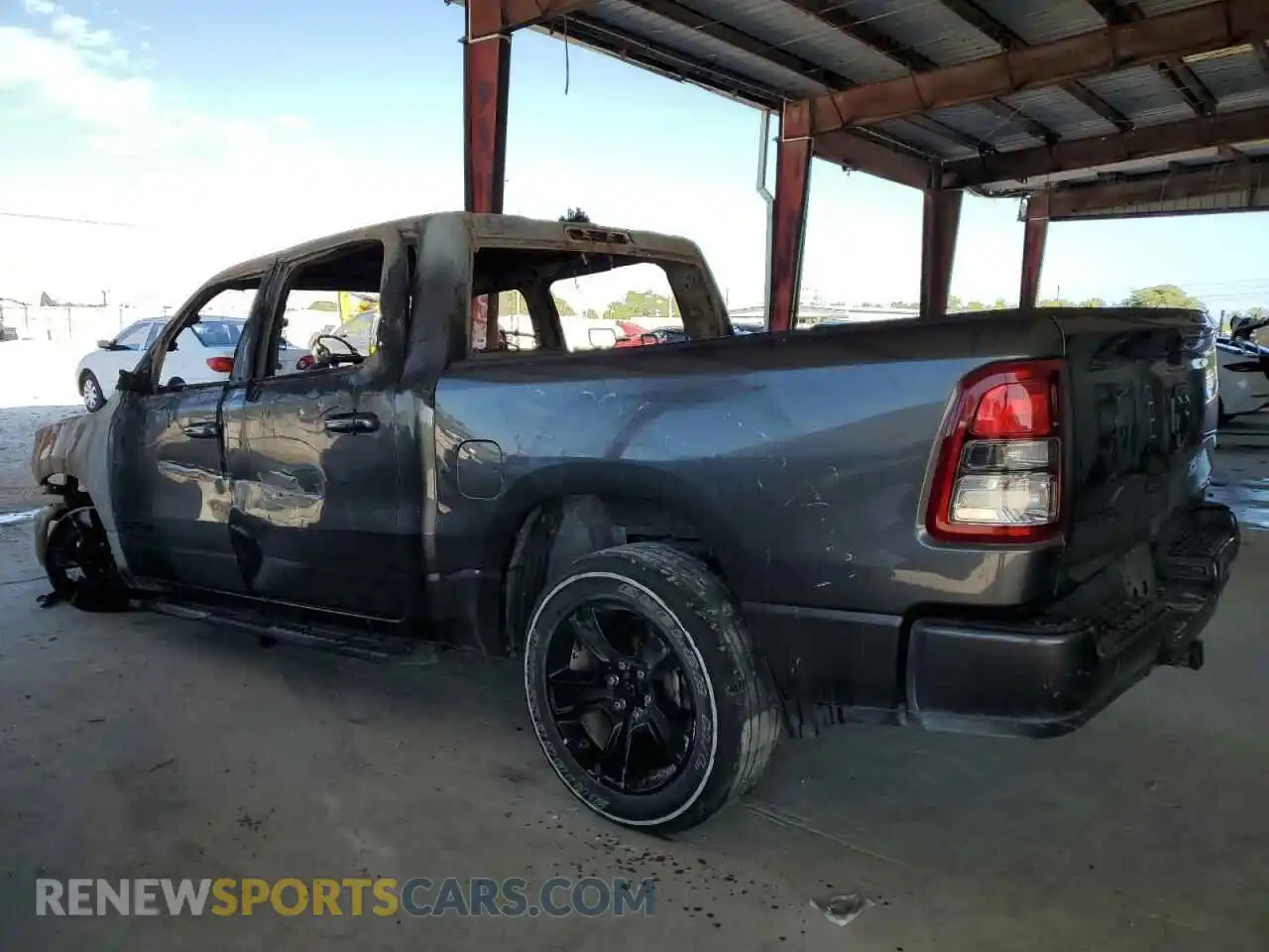 2 Photograph of a damaged car 1C6RREFG9NN398776 RAM 1500 2022