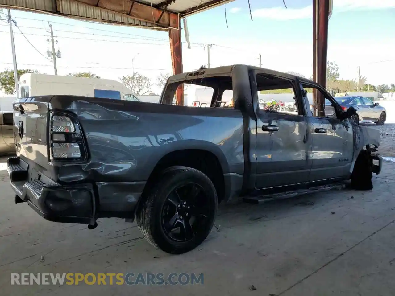 3 Photograph of a damaged car 1C6RREFG9NN398776 RAM 1500 2022