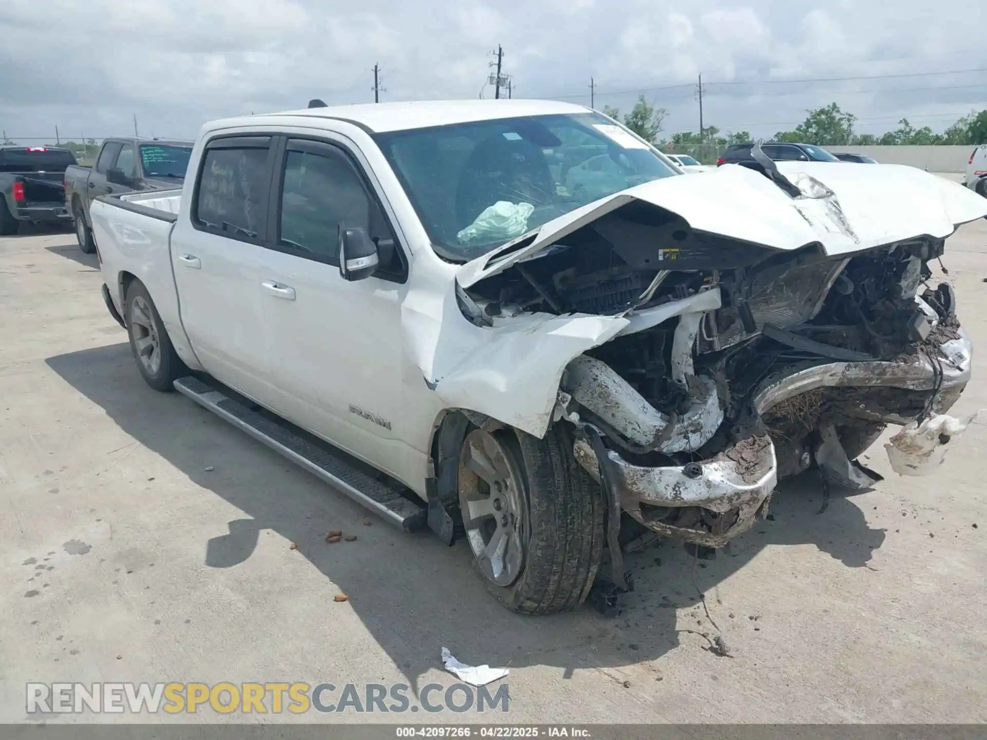 1 Photograph of a damaged car 1C6RREFM1NN326038 RAM 1500 2022