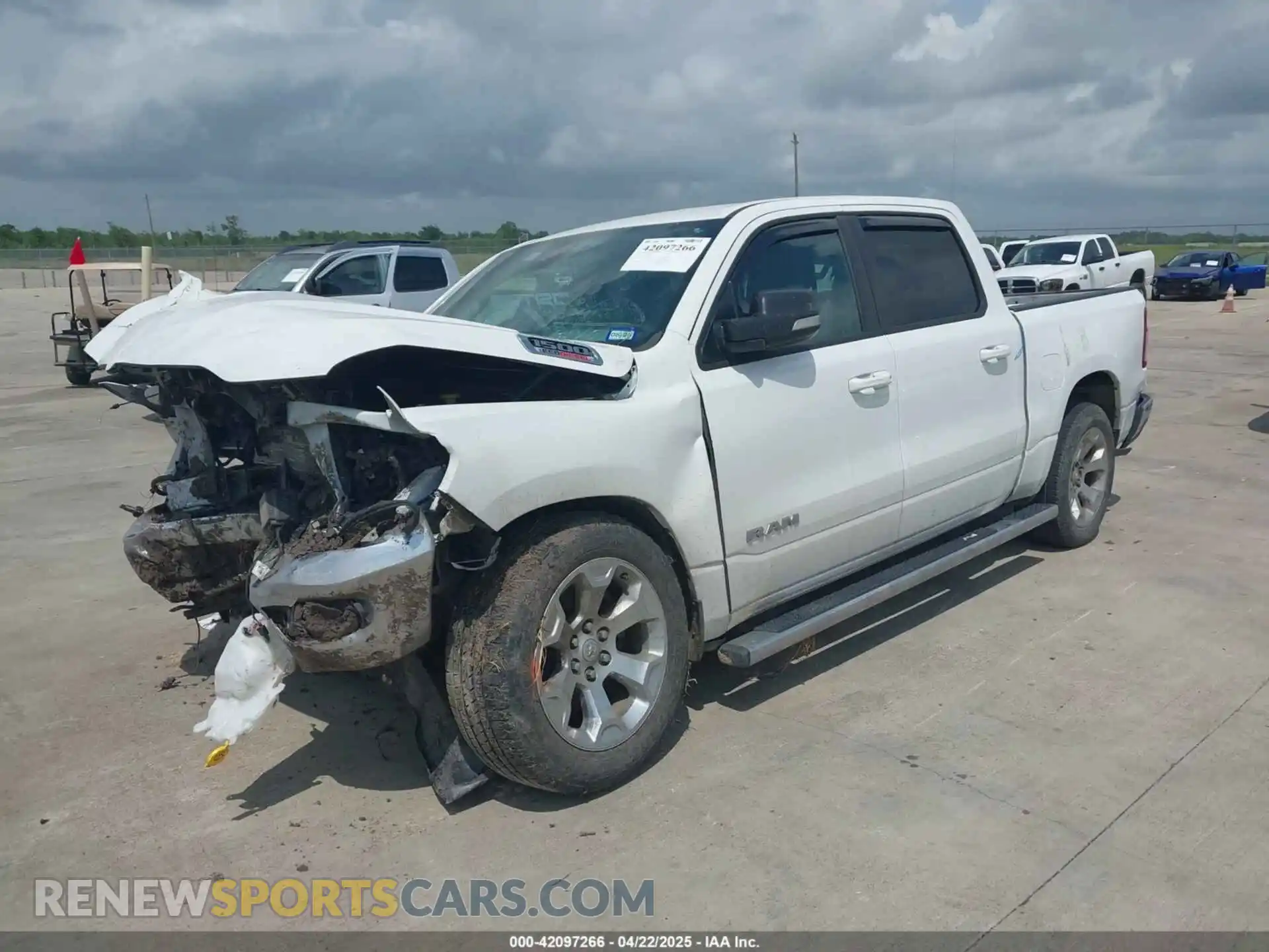2 Photograph of a damaged car 1C6RREFM1NN326038 RAM 1500 2022