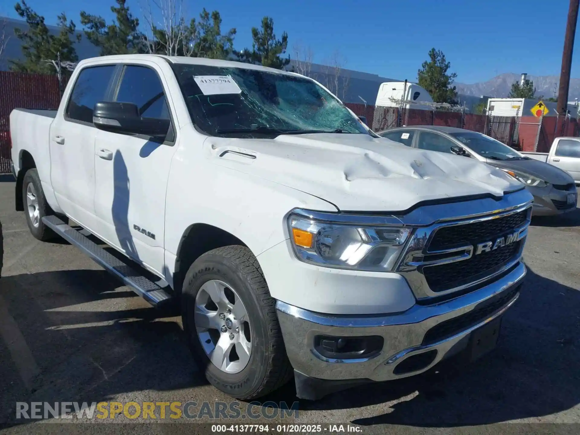 1 Photograph of a damaged car 1C6RREFM6NN431903 RAM 1500 2022