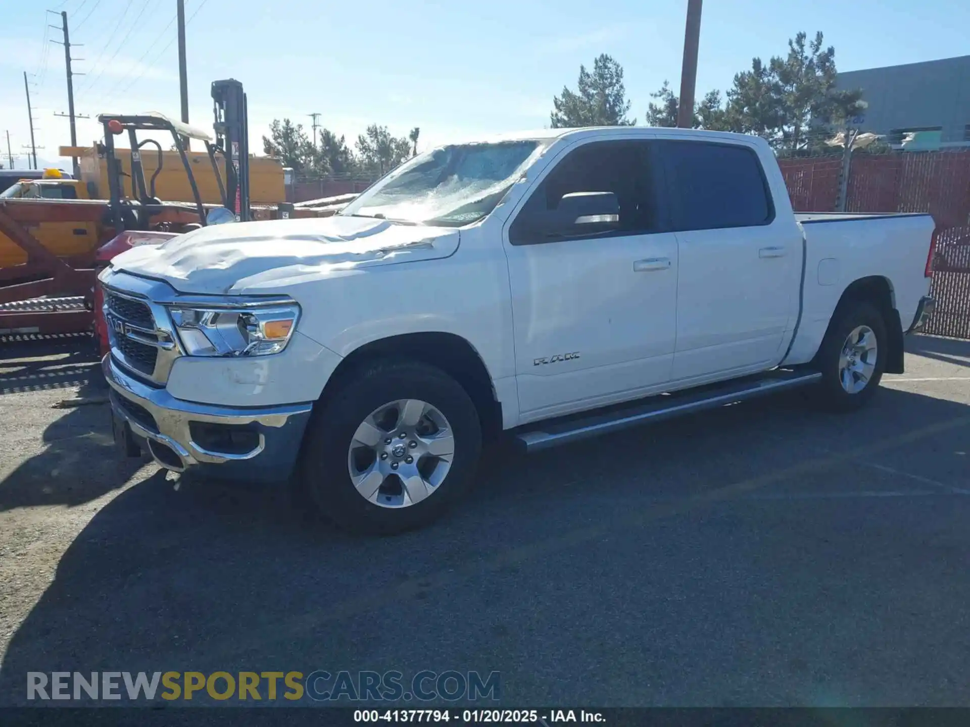 2 Photograph of a damaged car 1C6RREFM6NN431903 RAM 1500 2022