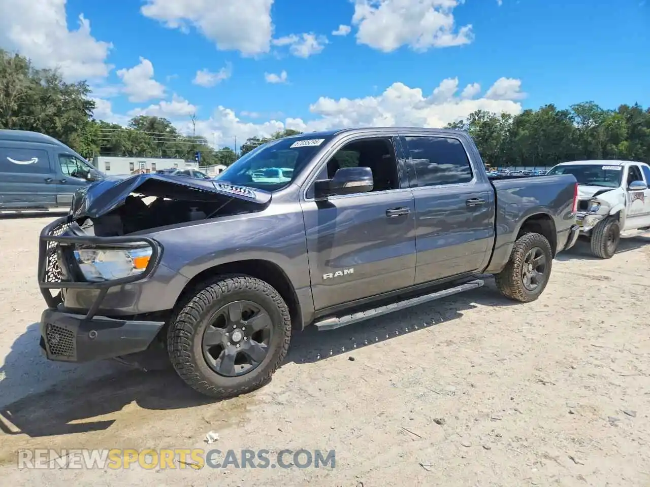1 Photograph of a damaged car 1C6RREFM8NN393851 RAM 1500 2022