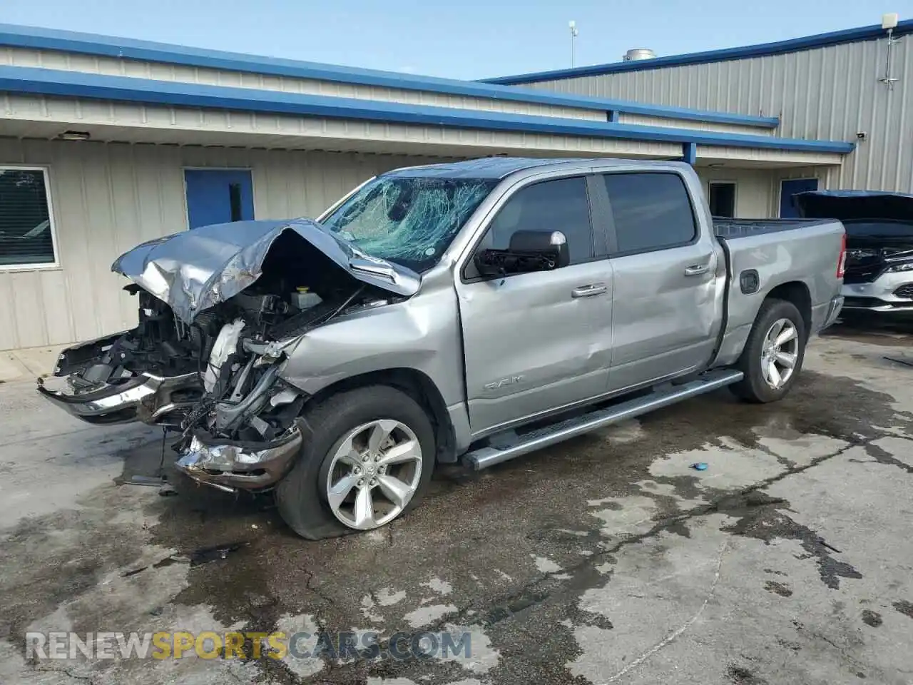 1 Photograph of a damaged car 1C6RREFMXNN452284 RAM 1500 2022