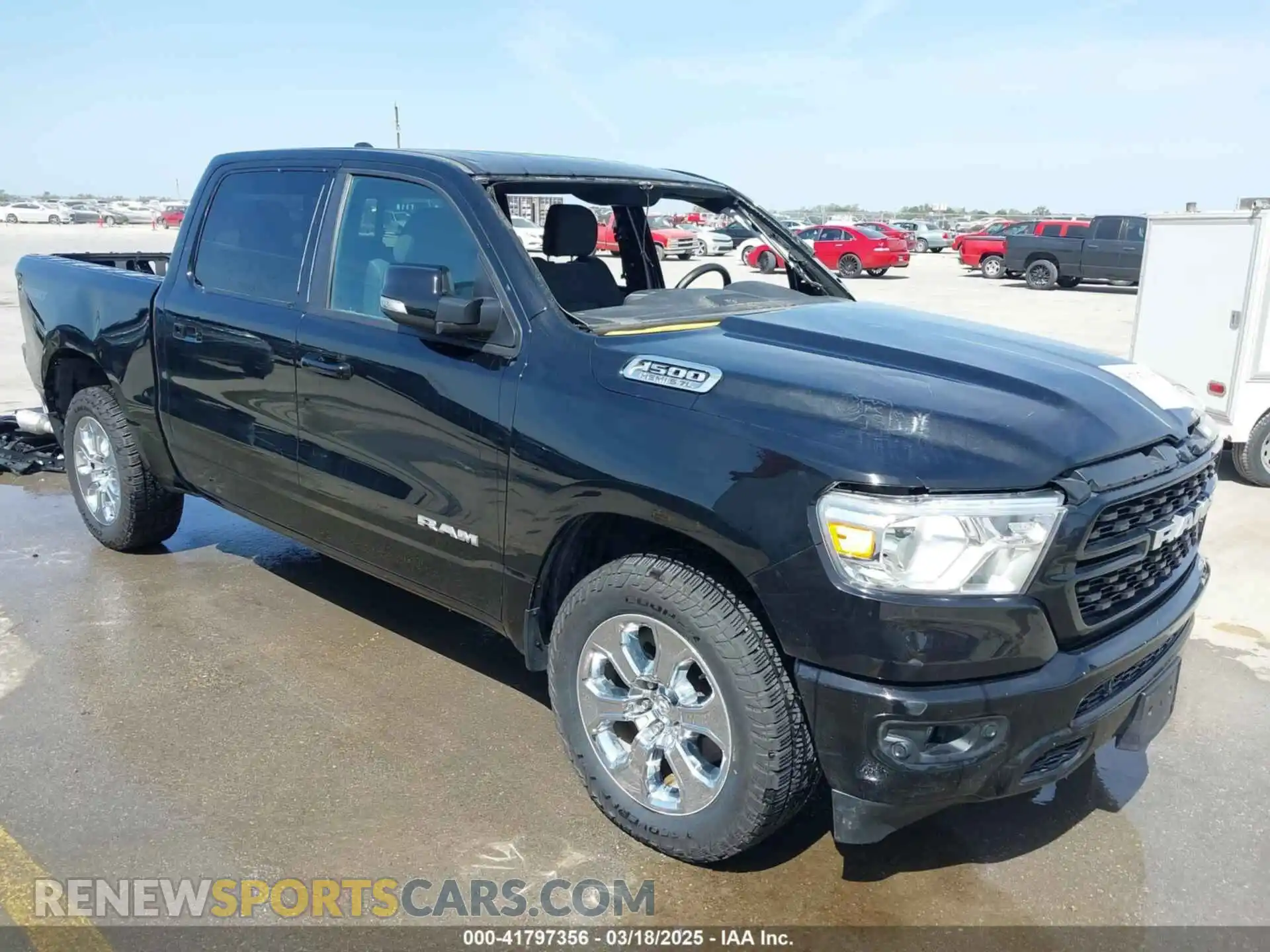 1 Photograph of a damaged car 1C6RREFT1NN190128 RAM 1500 2022