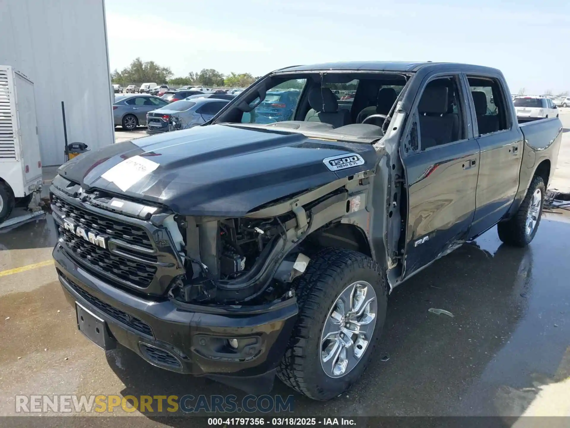 2 Photograph of a damaged car 1C6RREFT1NN190128 RAM 1500 2022