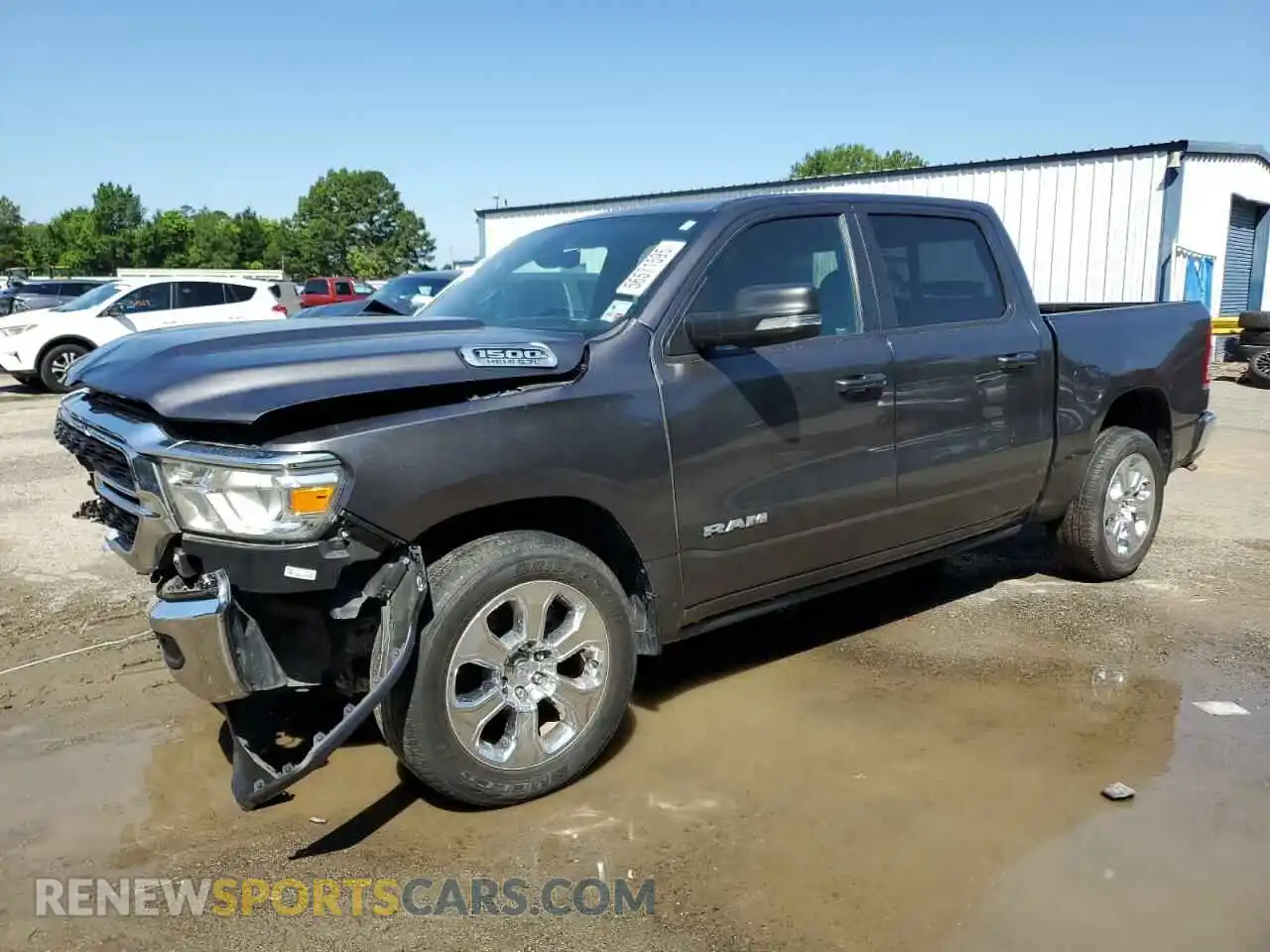 1 Photograph of a damaged car 1C6RREFT2NN173791 RAM 1500 2022