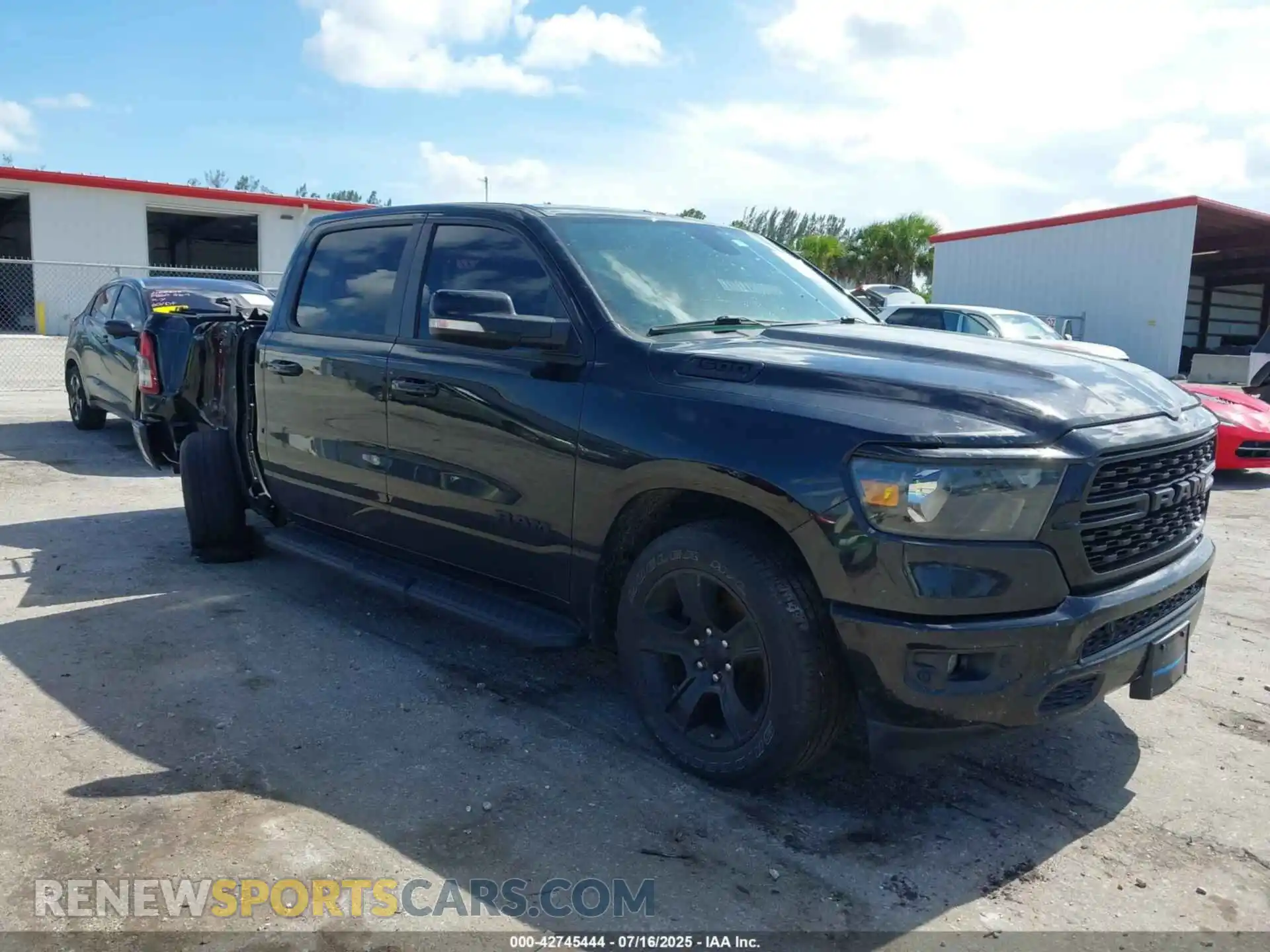 1 Photograph of a damaged car 1C6RREFT2NN194673 RAM 1500 2022