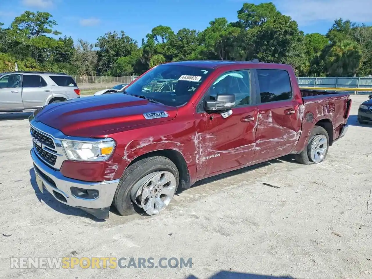 1 Photograph of a damaged car 1C6RREFT4NN124799 RAM 1500 2022