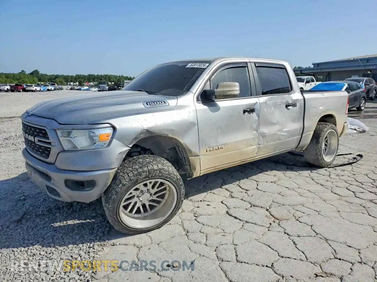 1 Photograph of a damaged car 1C6RREFT4NN291244 RAM 1500 2022