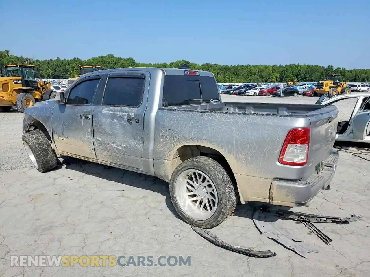 2 Photograph of a damaged car 1C6RREFT4NN291244 RAM 1500 2022