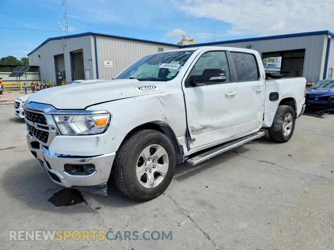 1 Photograph of a damaged car 1C6RREFT5NN276221 RAM 1500 2022
