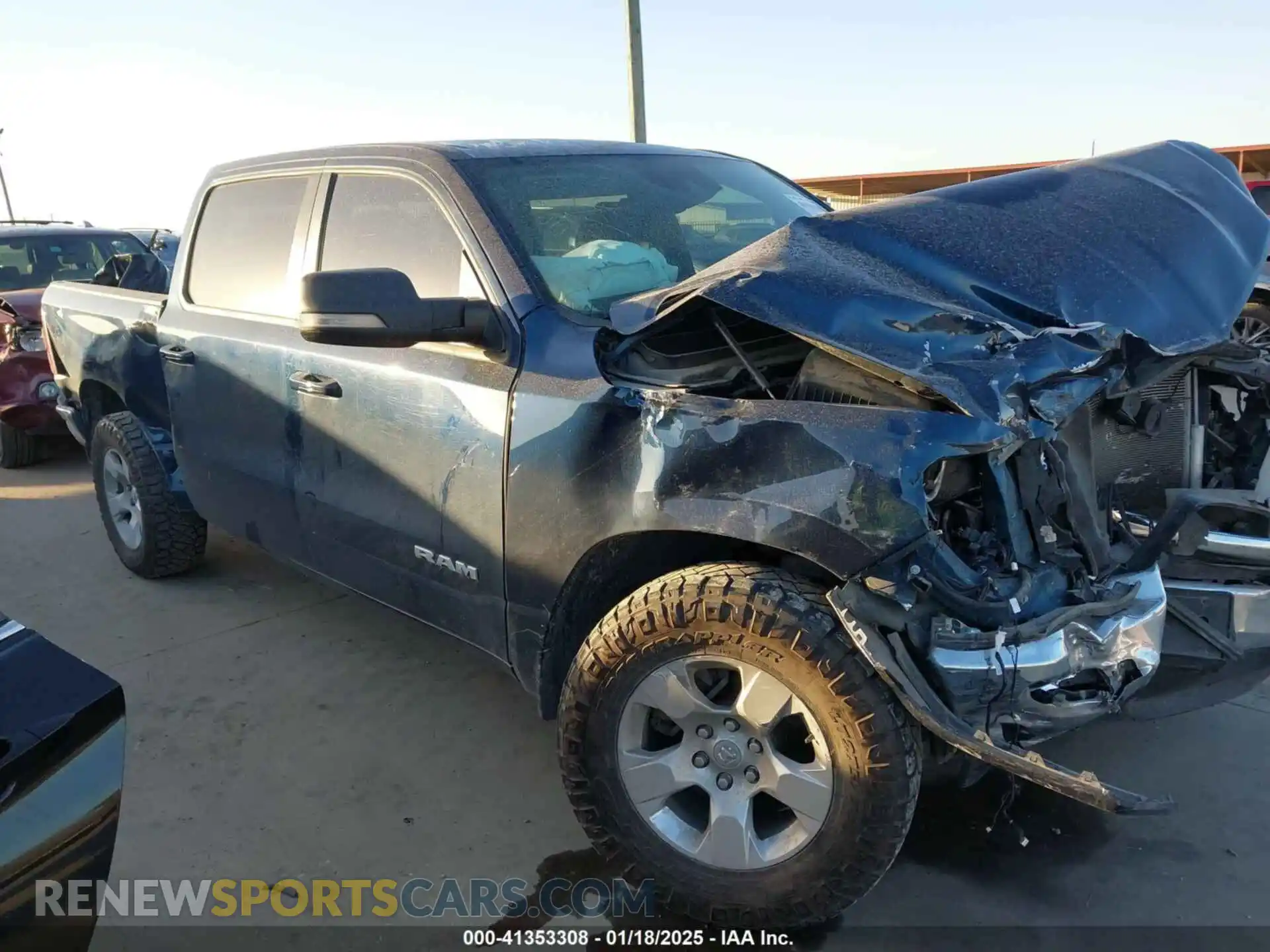 1 Photograph of a damaged car 1C6RREFT6NN201253 RAM 1500 2022