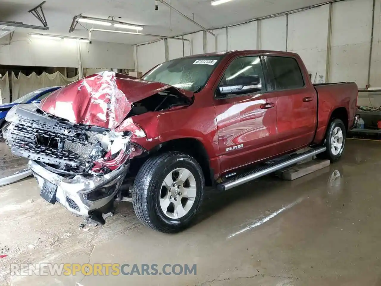 1 Photograph of a damaged car 1C6RREFT6NN276034 RAM 1500 2022