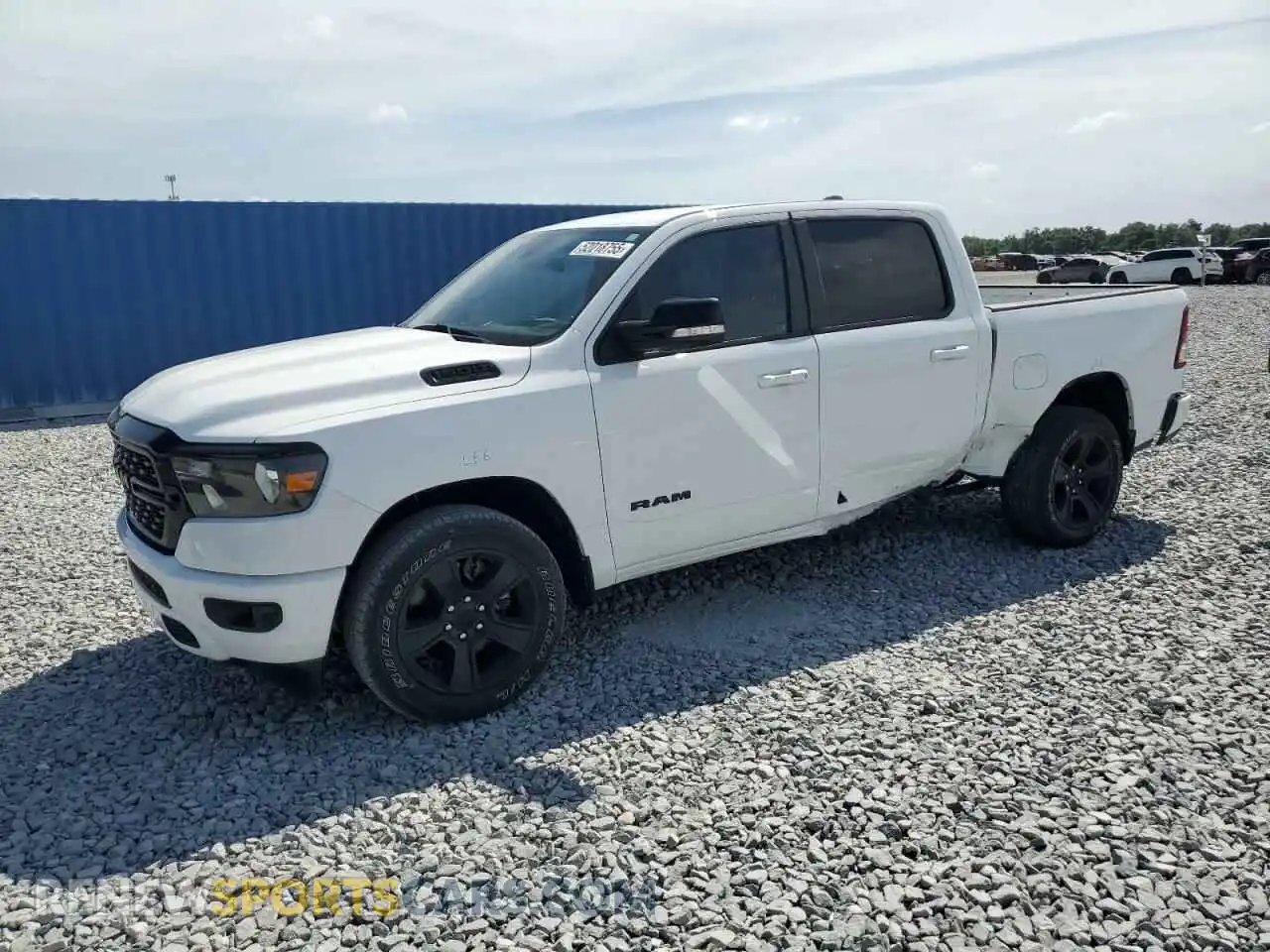 1 Photograph of a damaged car 1C6RREFT6NN312241 RAM 1500 2022