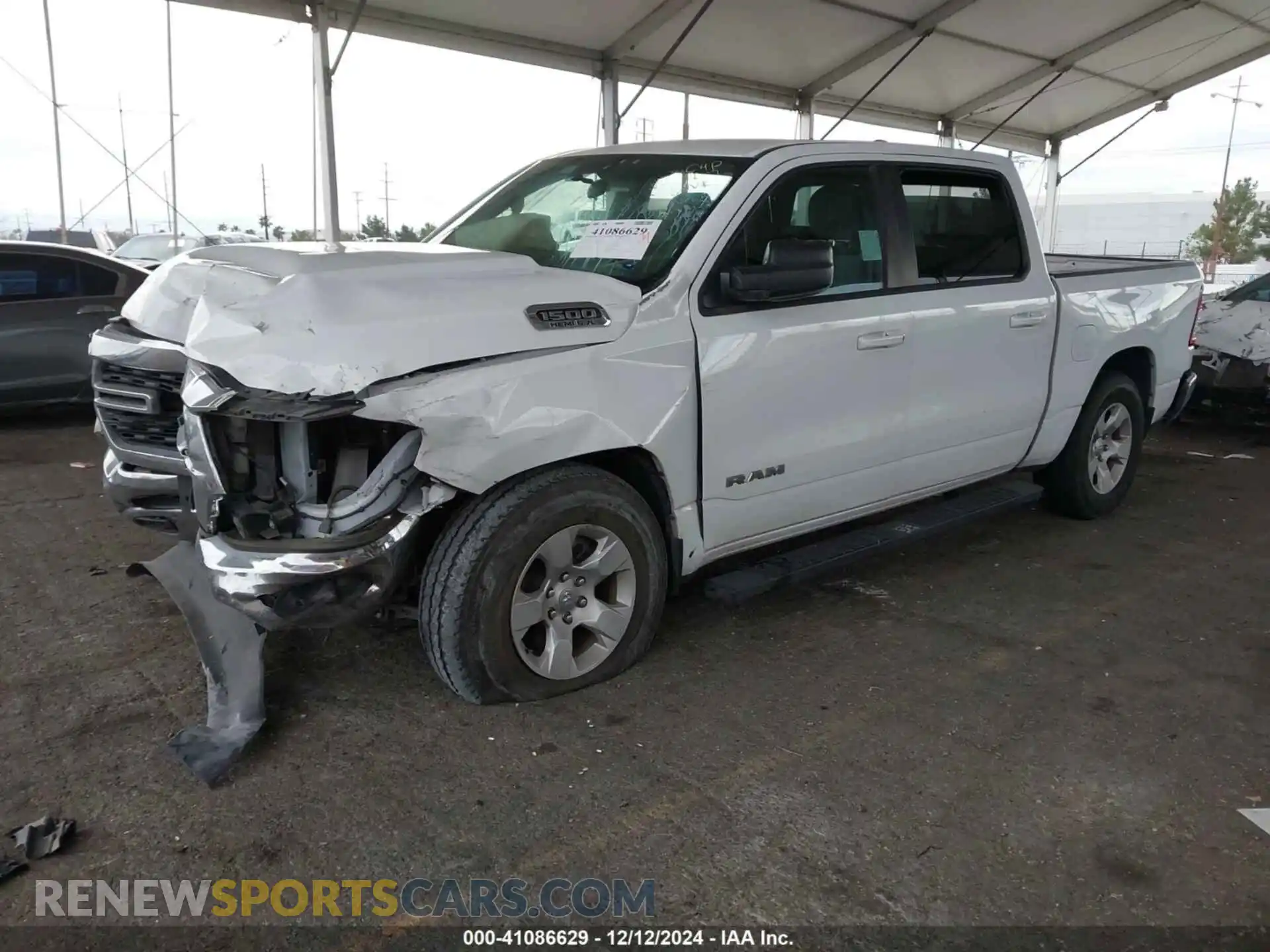 2 fotografías del automóvil dañado 1C6RREFT8NN350733 RAM 1500 2022