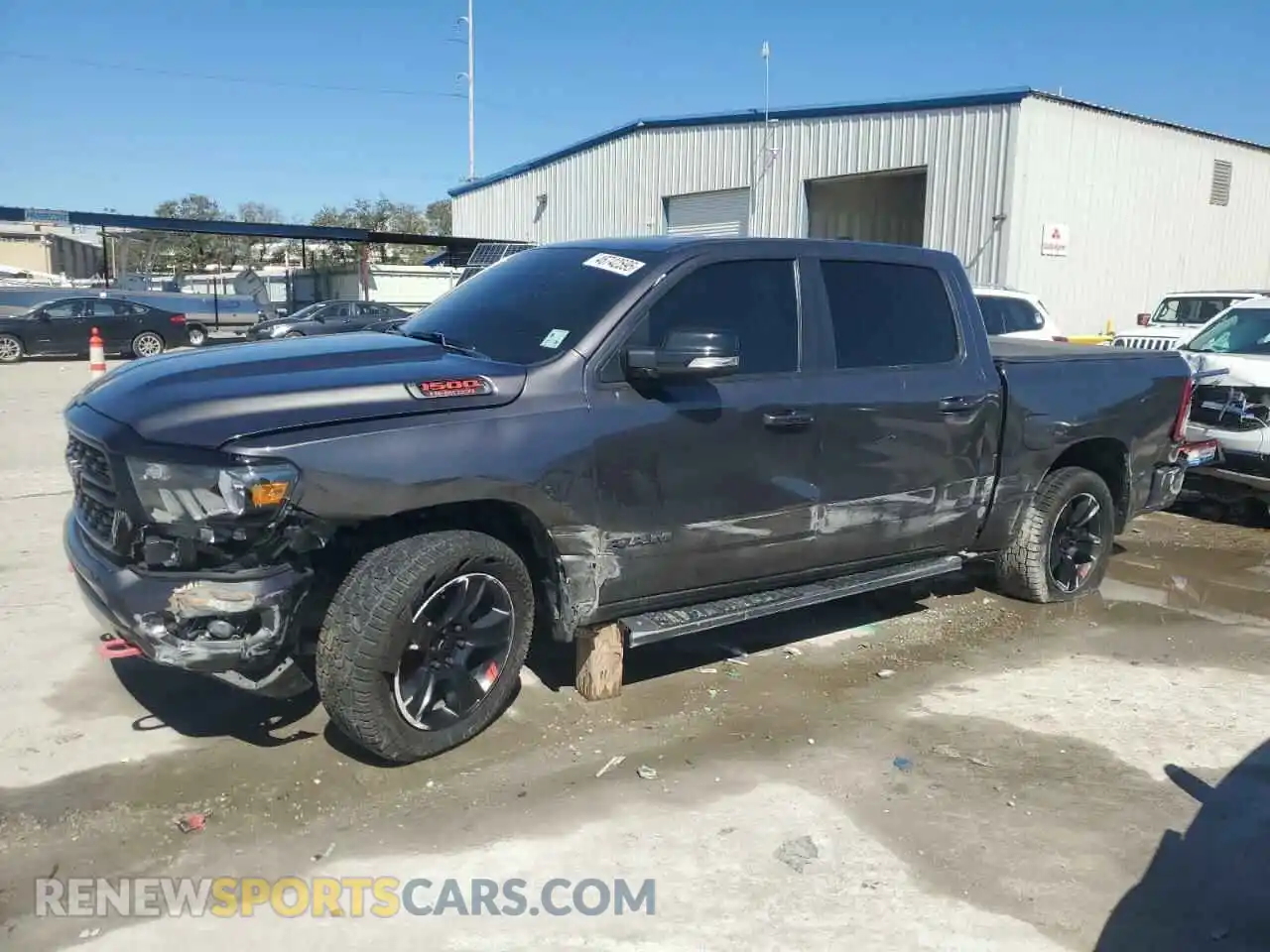 1 Photograph of a damaged car 1C6RREFT9NN113880 RAM 1500 2022