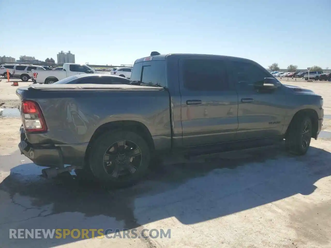 3 Photograph of a damaged car 1C6RREFT9NN113880 RAM 1500 2022