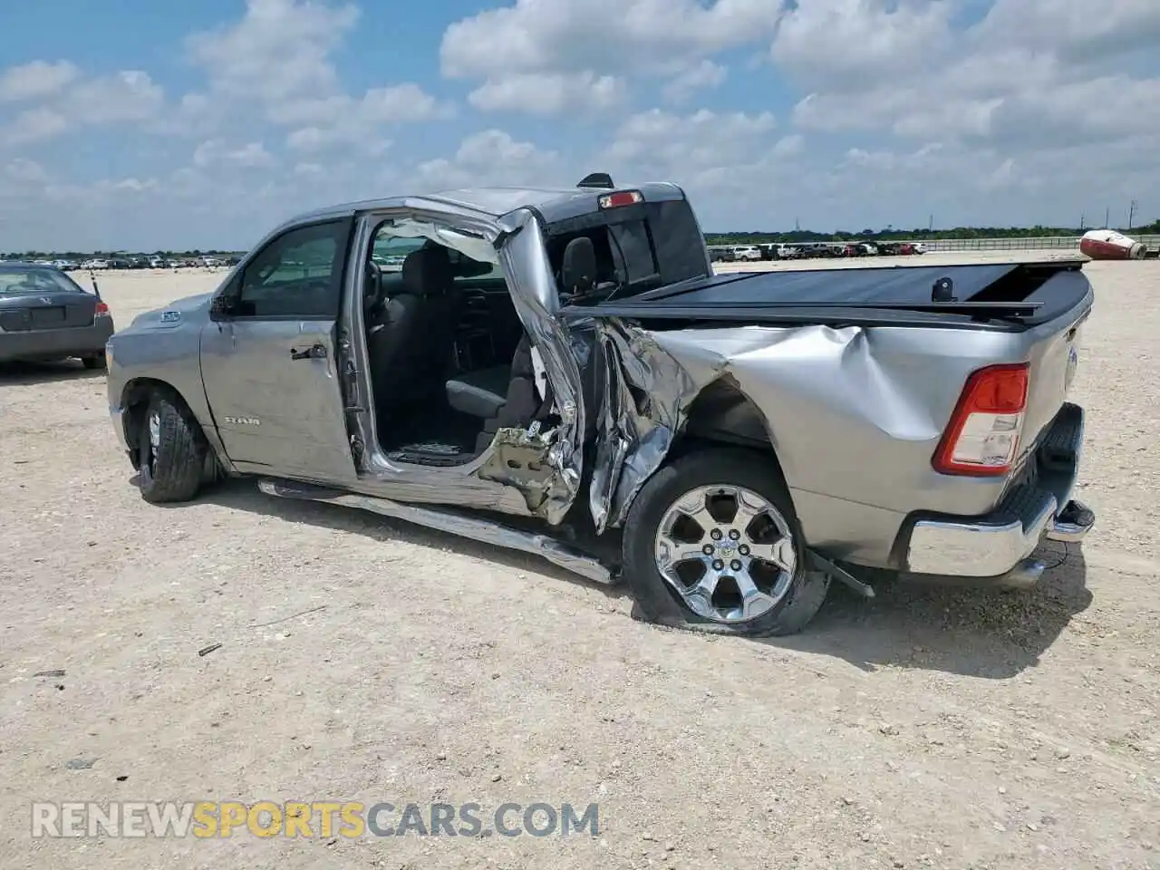 2 Photograph of a damaged car 1C6RREFT9NN193858 RAM 1500 2022