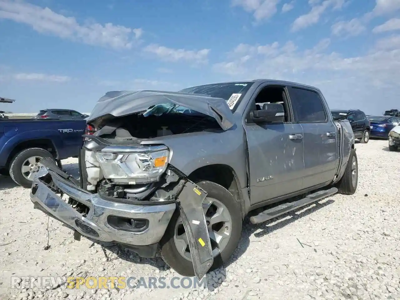 1 Photograph of a damaged car 1C6RREFT9NN431367 RAM 1500 2022
