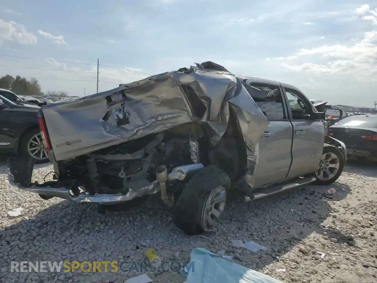 3 Photograph of a damaged car 1C6RREFT9NN431367 RAM 1500 2022