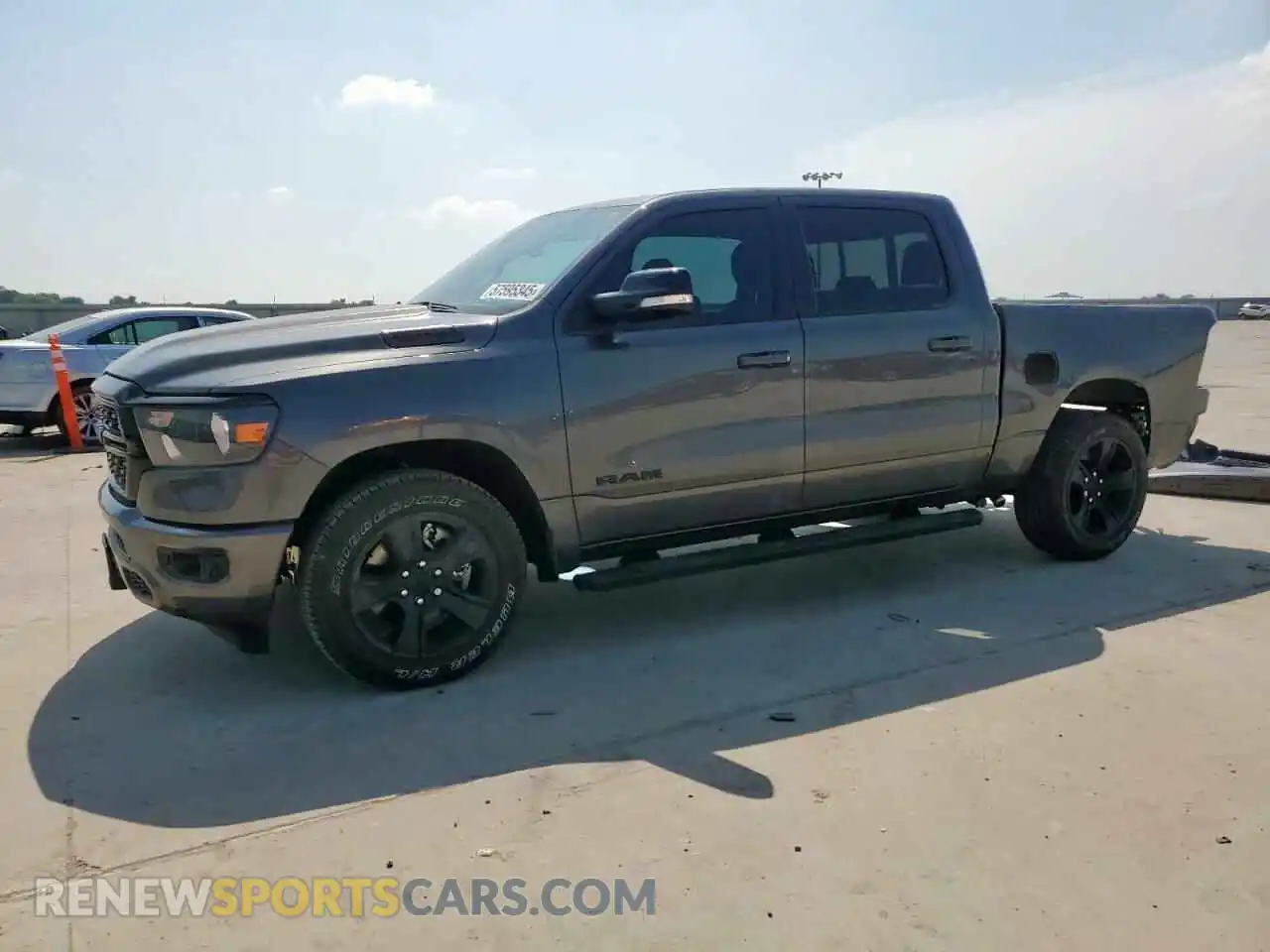 1 Photograph of a damaged car 1C6RREFTXNN113760 RAM 1500 2022
