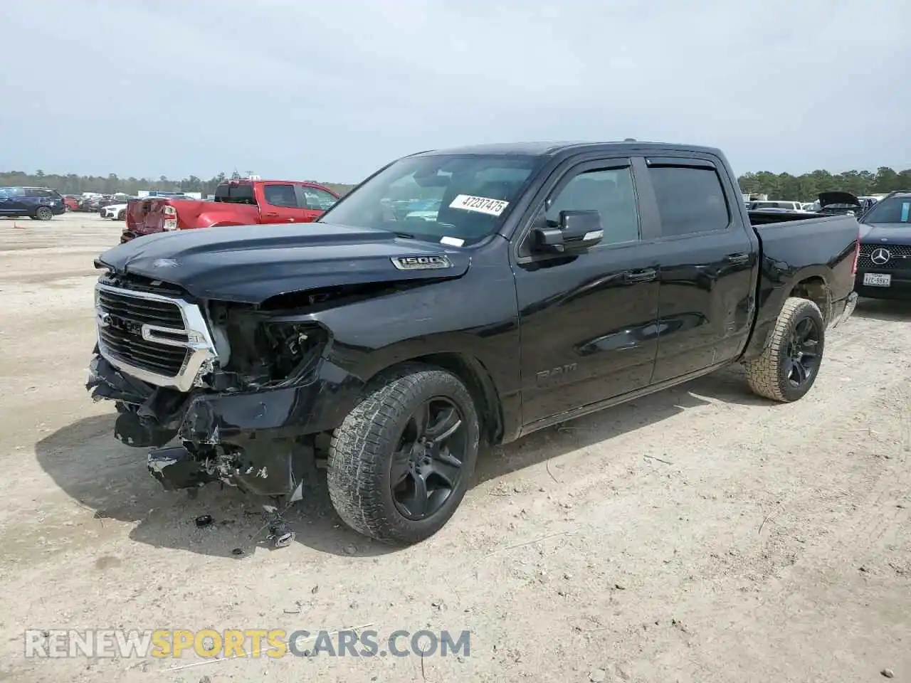 1 Photograph of a damaged car 1C6RREFTXNN157600 RAM 1500 2022