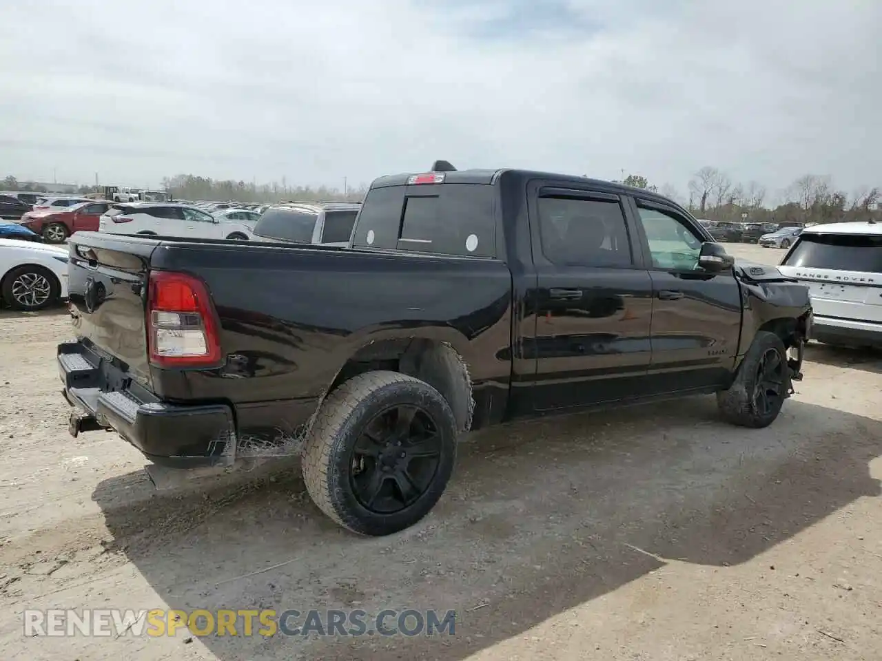 3 Photograph of a damaged car 1C6RREFTXNN157600 RAM 1500 2022