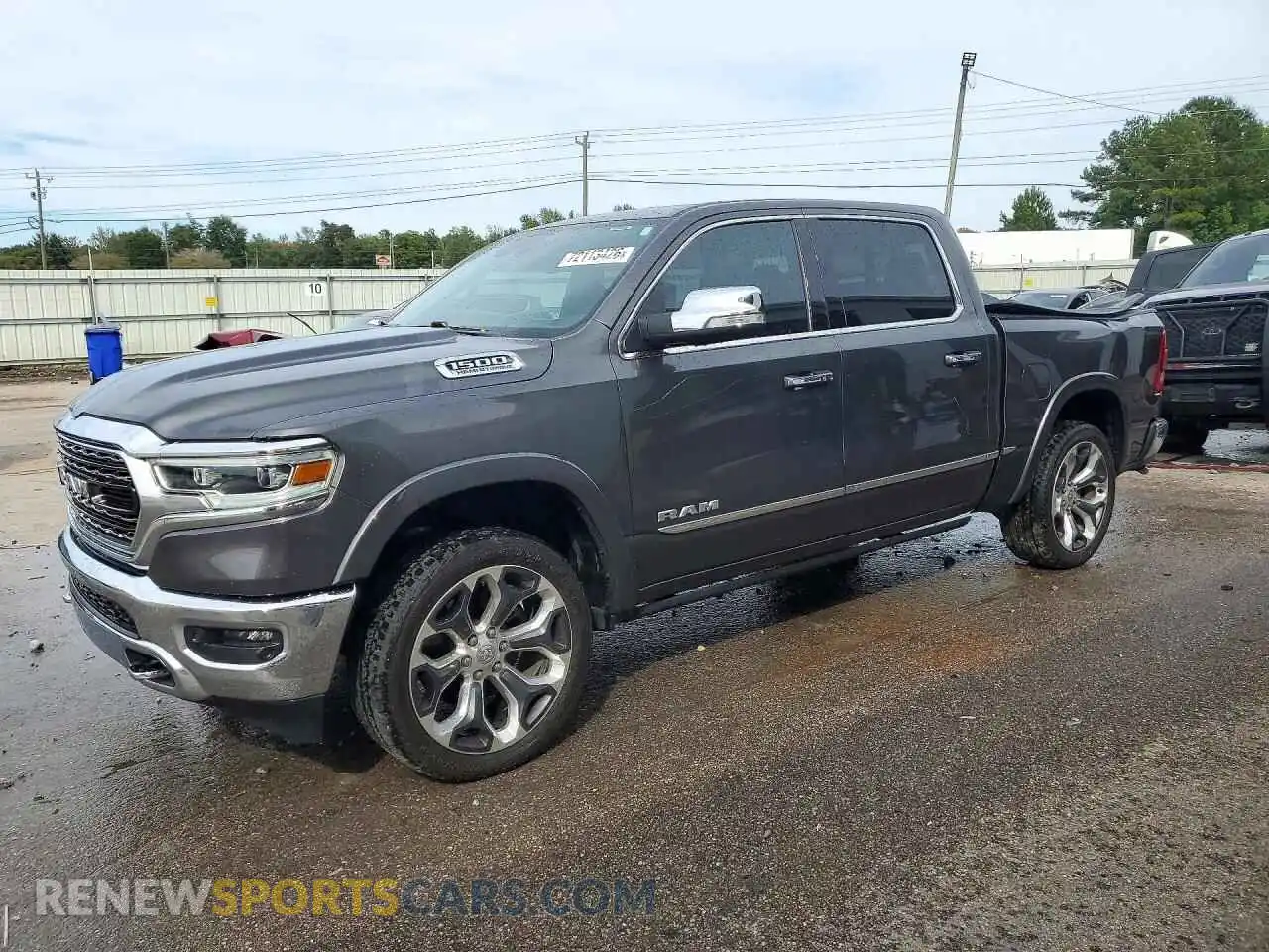 1 Photograph of a damaged car 1C6RREHT6NN329361 RAM 1500 2022