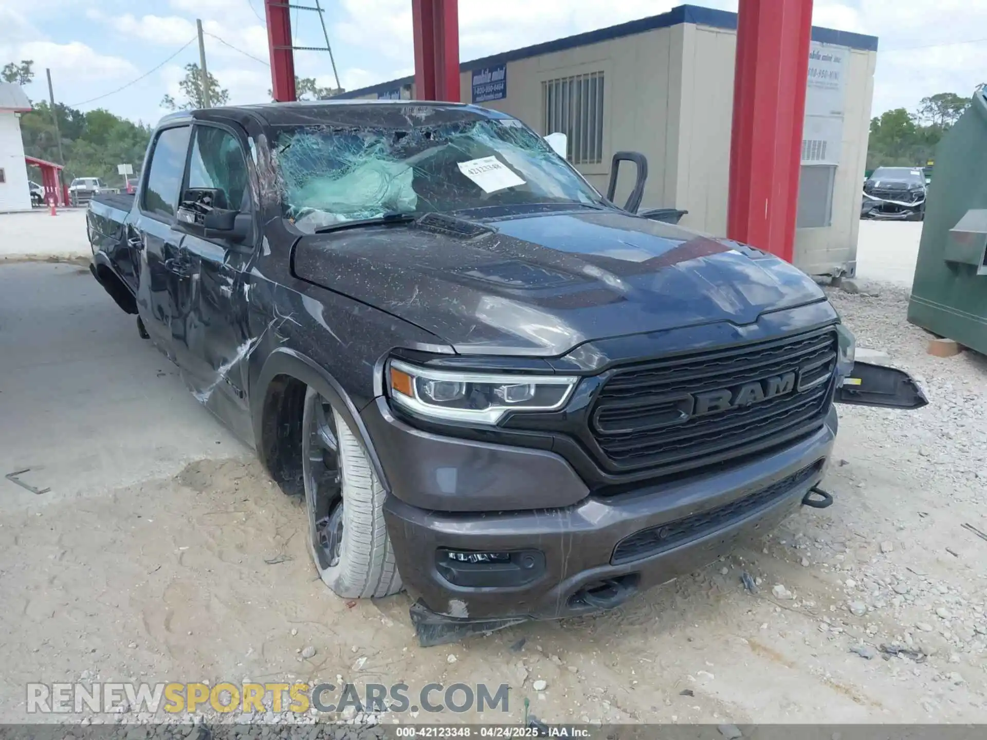 1 Photograph of a damaged car 1C6RREHT8NN187076 RAM 1500 2022