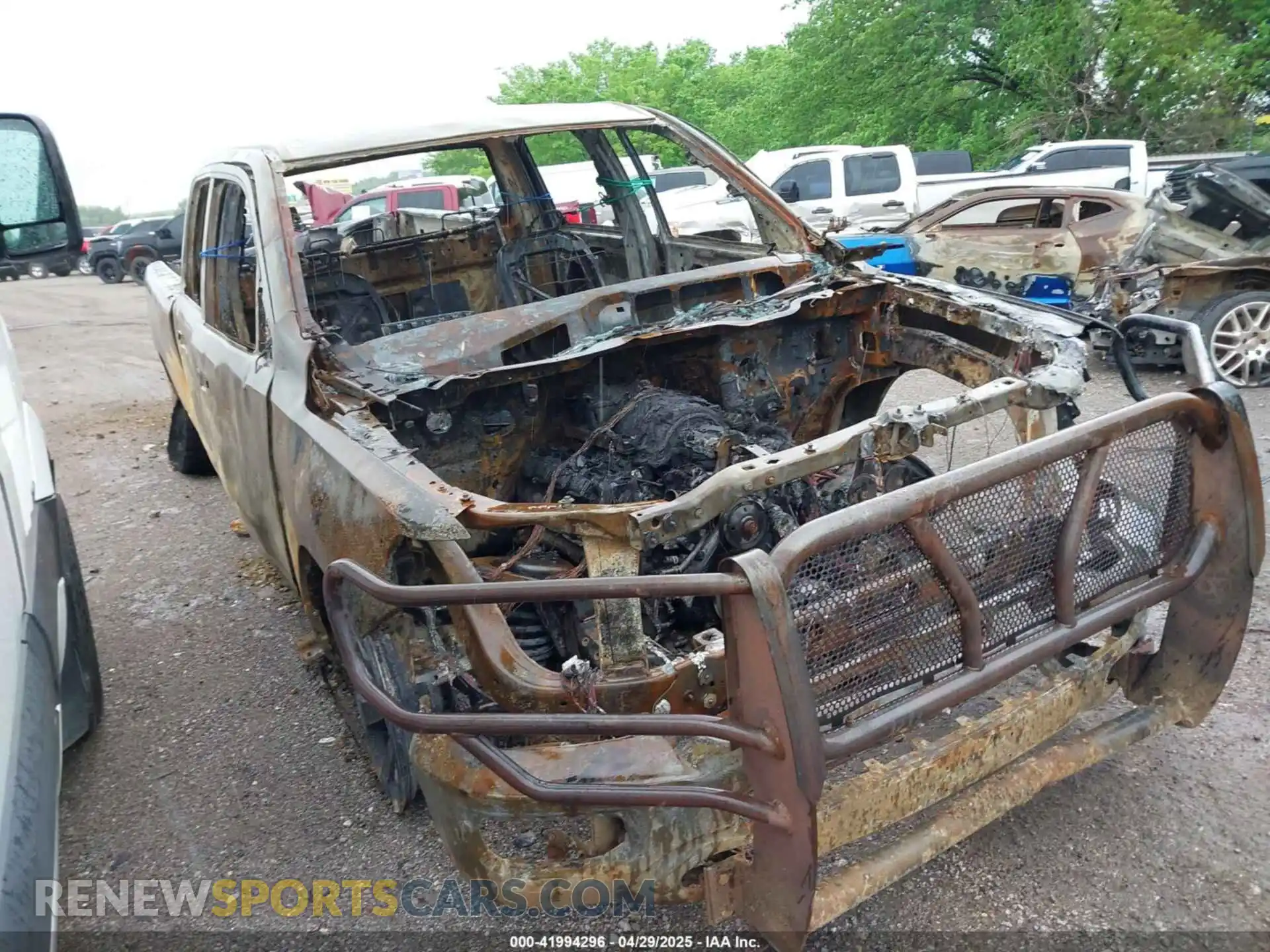 1 Photograph of a damaged car 1C6RRENT8NN451322 RAM 1500 2022