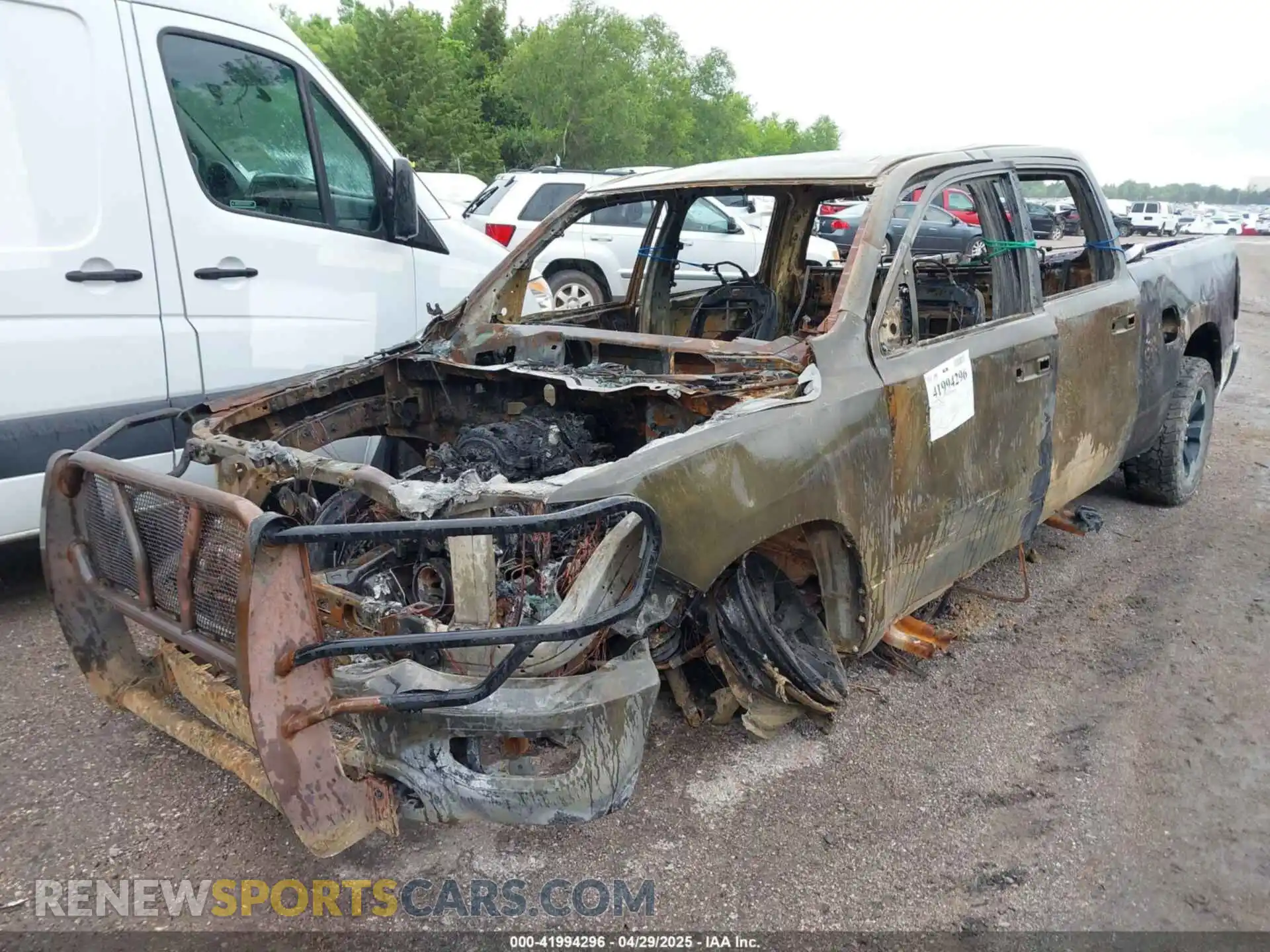 2 Photograph of a damaged car 1C6RRENT8NN451322 RAM 1500 2022