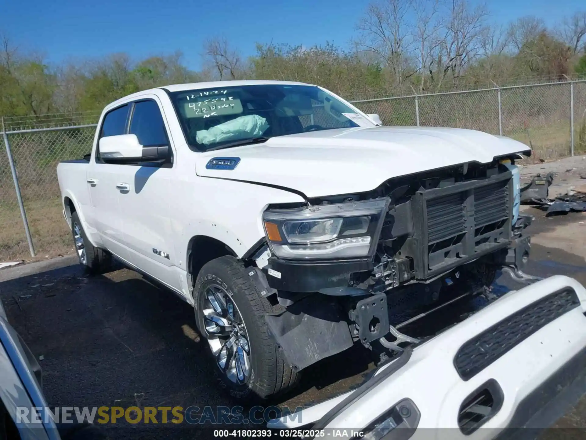 1 Photograph of a damaged car 1C6RRERT1NN475598 RAM 1500 2022
