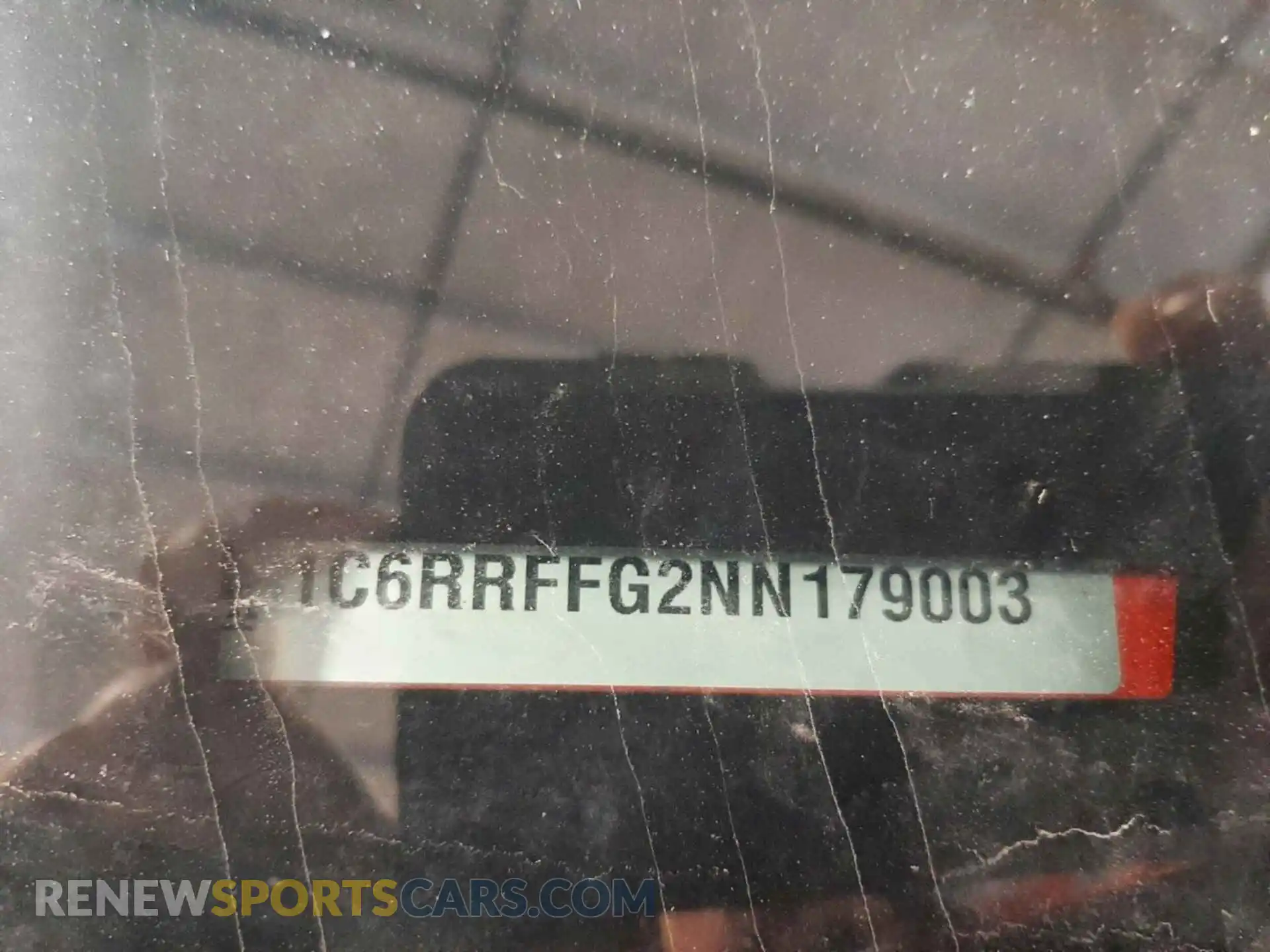 3 Photograph of a damaged car 1C6RRFFG2NN179003 RAM 1500 2022