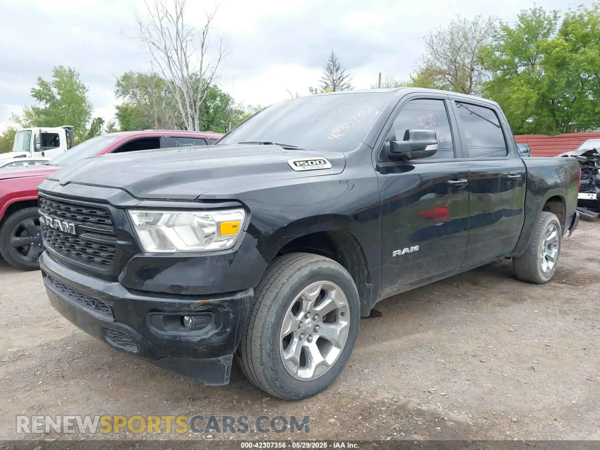 2 Photograph of a damaged car 1C6RRFFG2NN423975 RAM 1500 2022