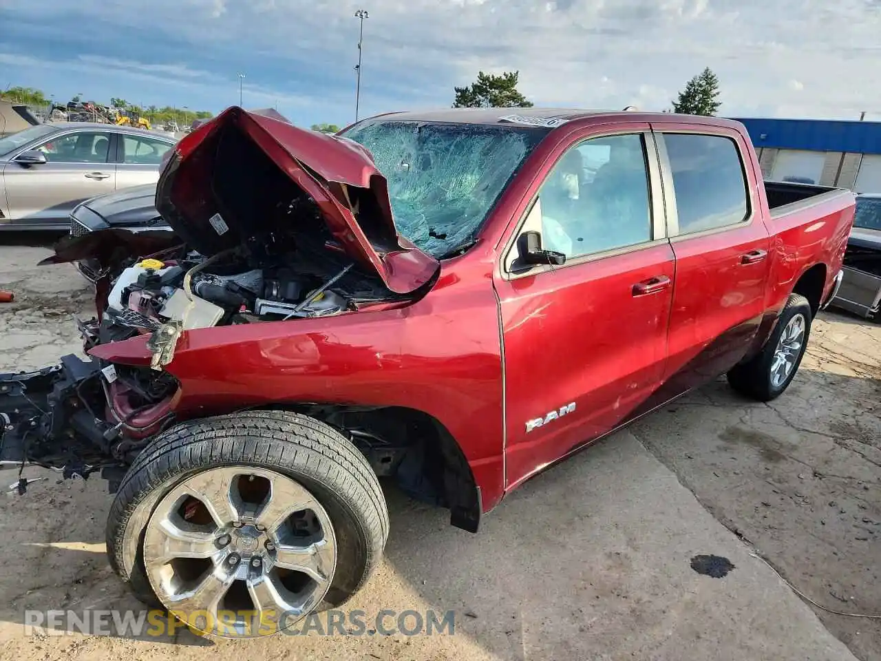 1 Photograph of a damaged car 1C6RRFFG3NN258759 RAM 1500 2022