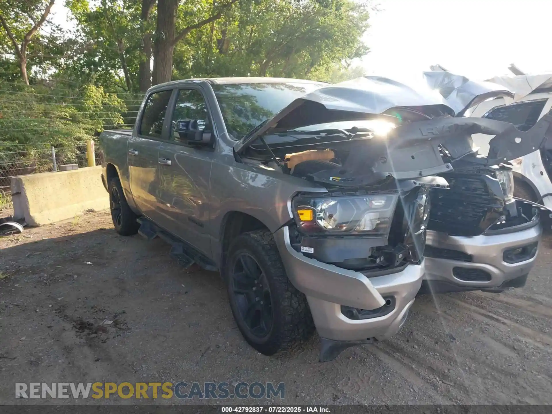 1 Photograph of a damaged car 1C6RRFFG3NN295875 RAM 1500 2022