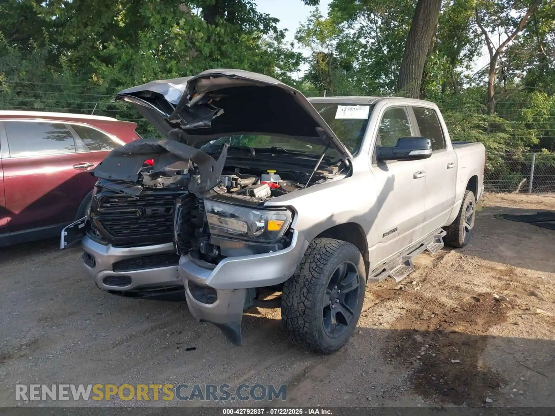 2 Photograph of a damaged car 1C6RRFFG3NN295875 RAM 1500 2022
