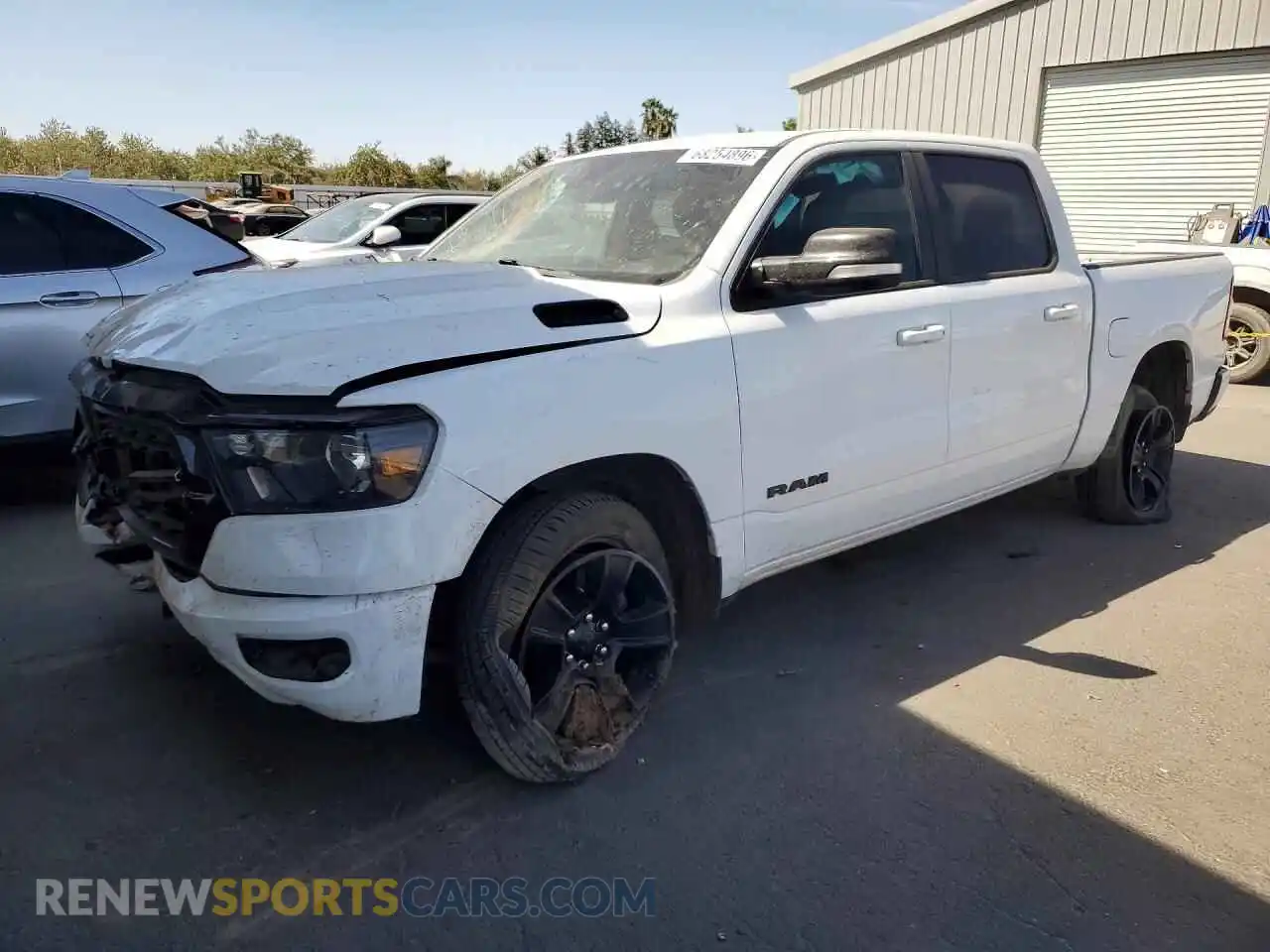 1 Photograph of a damaged car 1C6RRFFG8NN385281 RAM 1500 2022