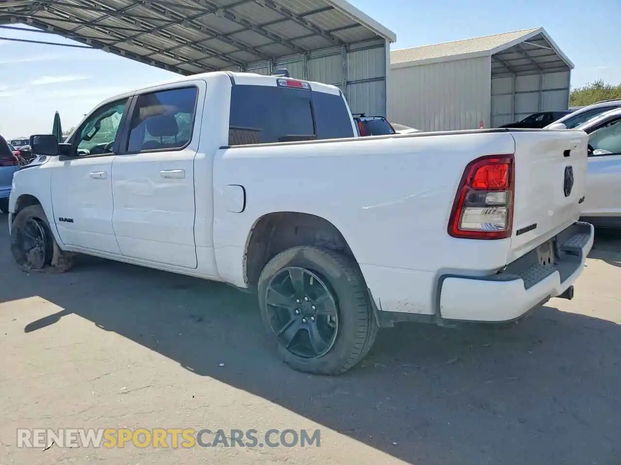 2 Photograph of a damaged car 1C6RRFFG8NN385281 RAM 1500 2022