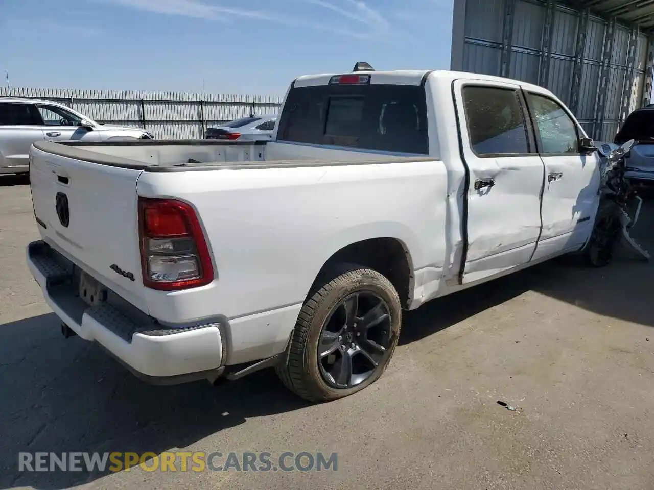 3 Photograph of a damaged car 1C6RRFFG8NN385281 RAM 1500 2022