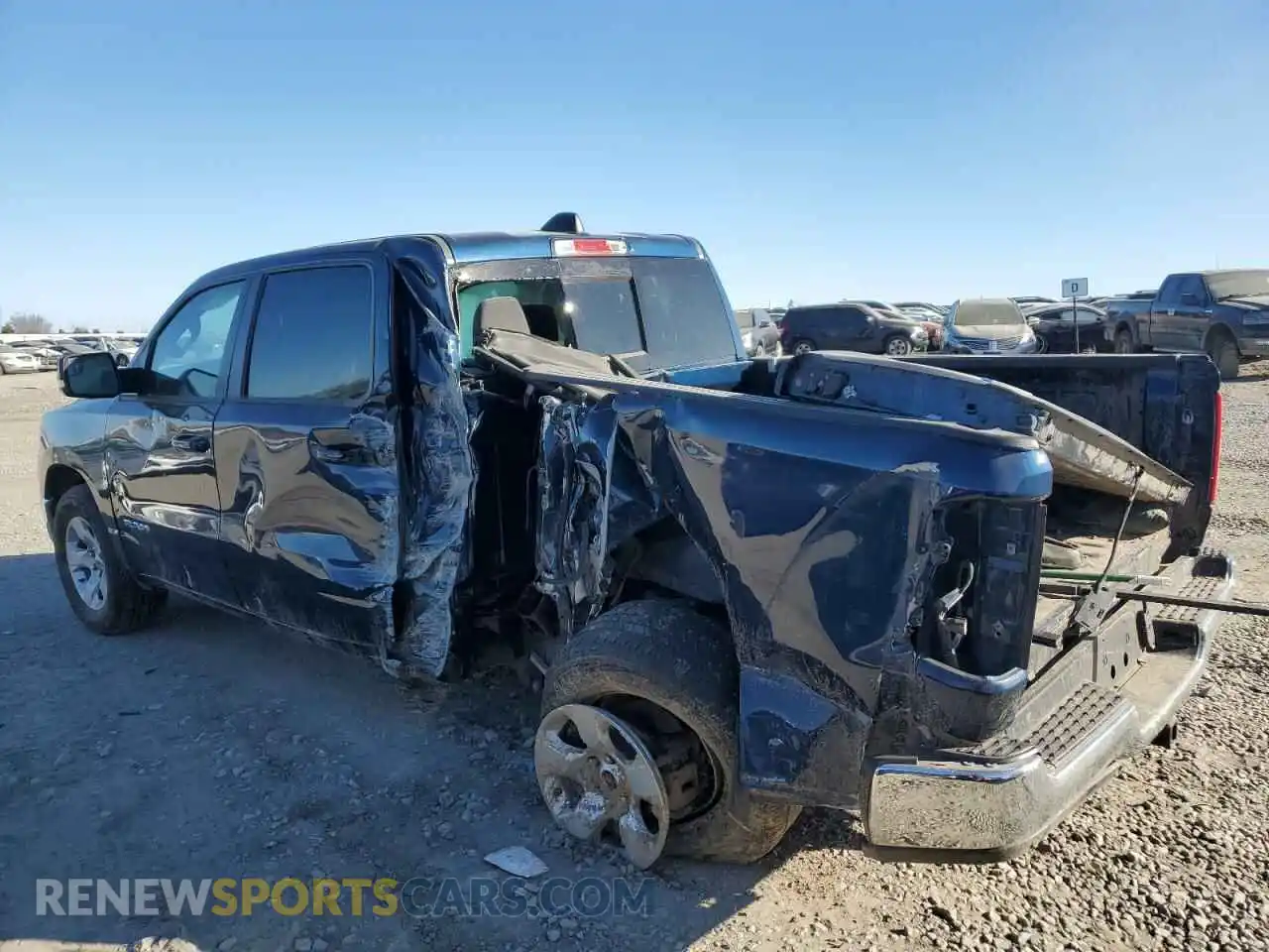 2 Photograph of a damaged car 1C6RRFFG9NN300707 RAM 1500 2022