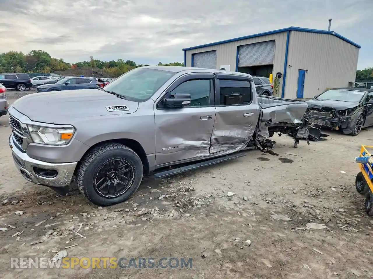 1 Photograph of a damaged car 1C6RRFFGXNN287840 RAM 1500 2022