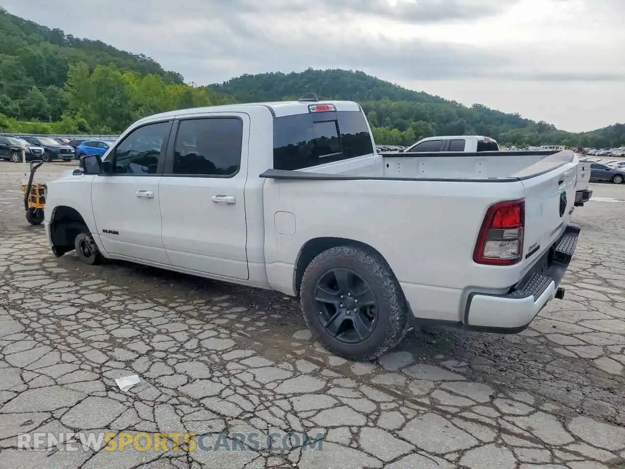 2 Photograph of a damaged car 1C6RRFFGXNN310730 RAM 1500 2022