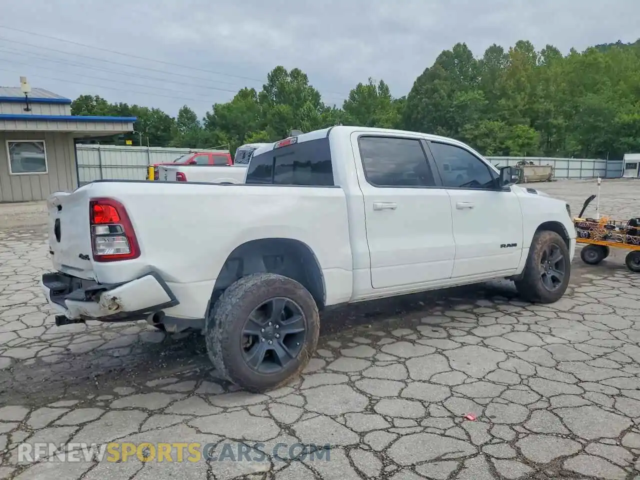3 Photograph of a damaged car 1C6RRFFGXNN310730 RAM 1500 2022